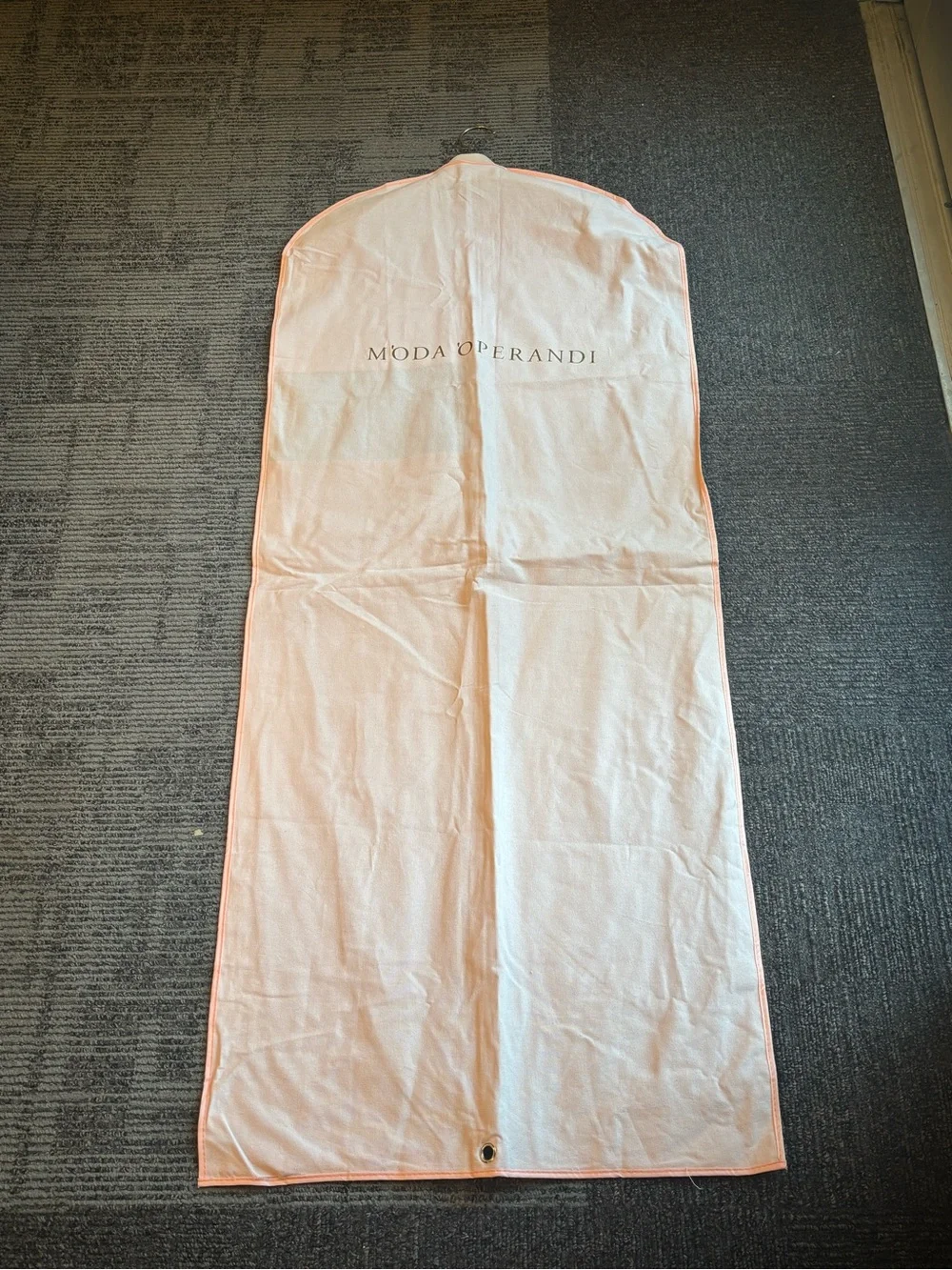 Moda Operandi garment bag and hanger